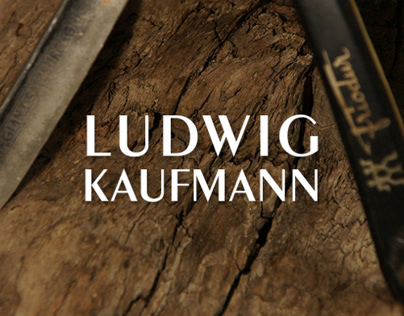 Logo Ludwig Kaufmann Hairdesign auf Holz